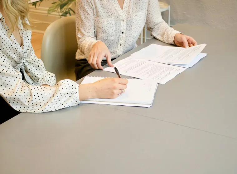 Going through a form together at a desk